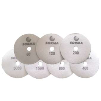 Sorma I DIA MX flexible wet/dry polishing discs. Designed for polishing marble, granite, concrete, and other hard materials. They are available in various grits, indicated by the numbers on the discs (60, 120, 200, 400, 800, 1500, 3000).